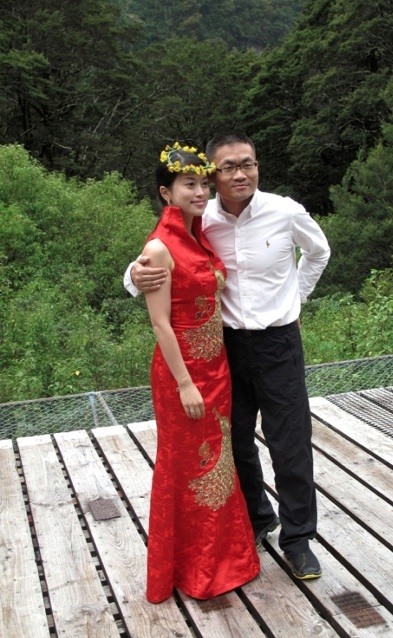 Wei Sun in traditional Chinese wedding dress